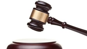 wooden judge gavel on white background