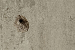 Bullet hole in the wall