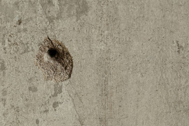 Bullet hole in the wall